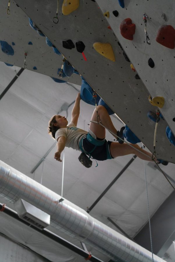 Sophomore+Peri+Brooks-Randall+scales+a+climbing+wall+at+MetroRock+Vermont+in+Essex+Junction+March+29.