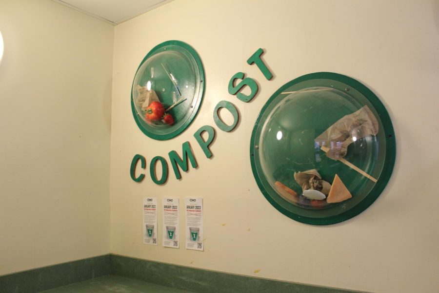 A compost bin outside the University Marché for students to dispose of food waste. 
