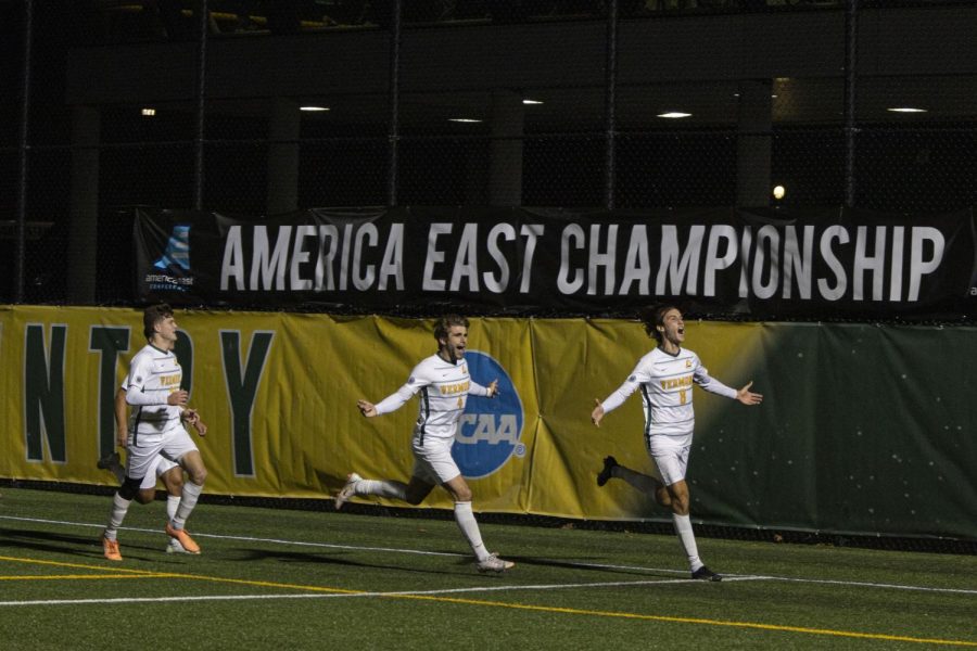 Members of the UVM men's soccer team celebrate a goal during a 2021 game. The Catamounts will look to advance to the NCAA national tournament semifinals in their quarterfinal match against Syracuse University Dec. 3.