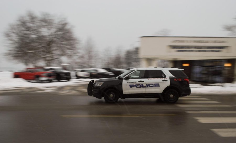 A Burlington Police car driving past the department station on 1 North Ave. Jan. 20. Mayor Miro Weinberger released a new public safety plan focusing on 2022’s historic number of homicides. 