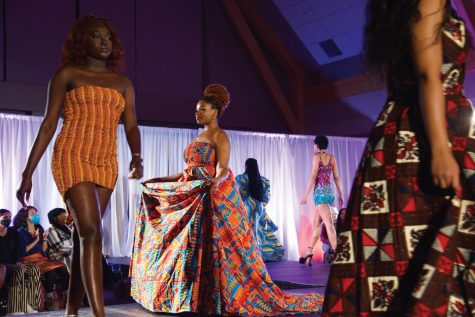 Students walk the runway at the Black Student Union’s fashion show “Living in Color” in the Grand Maple Ballroom Feb. 25. The name is reflective of Black artists in the fashion industry as well as the active experience of being a person of color. 