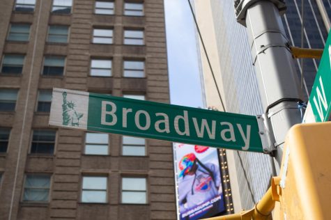 A close-up of the Broadway street sign.
