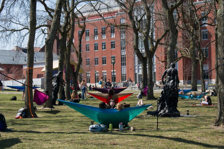 Students+hammocking+on+the+Fleming+green+in+response+to+the+change+to+warm+weather+April+13.
