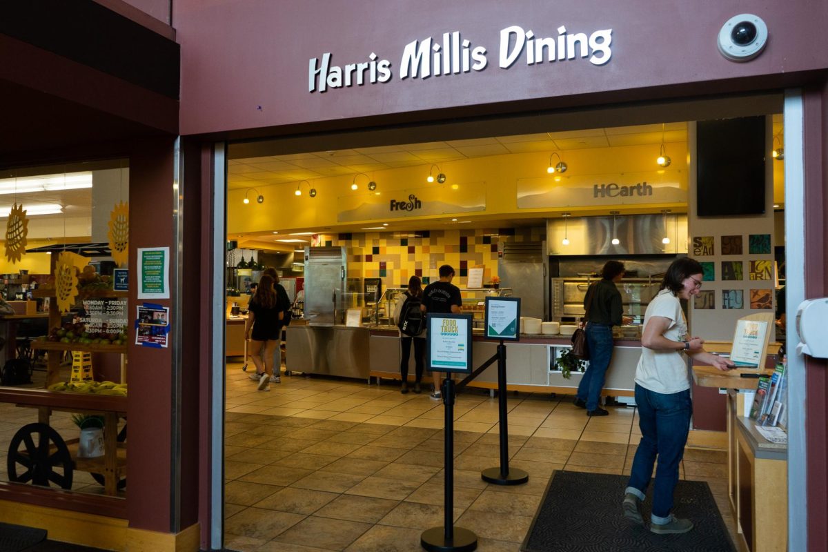 Students enter the Harris Millis dining hall and browse the food options Sept. 23.