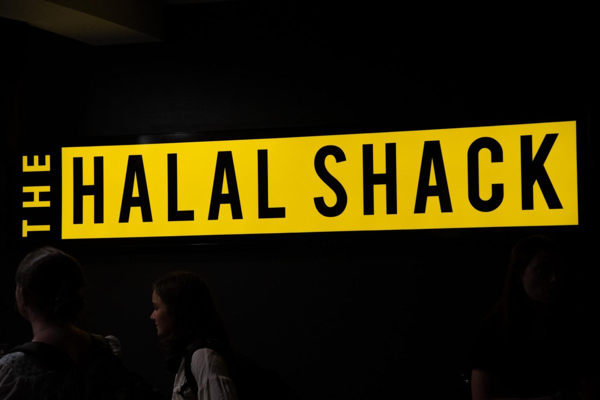 Students wait in line at one of UVM’s newest dining locations, Halal Shack Sept 6.