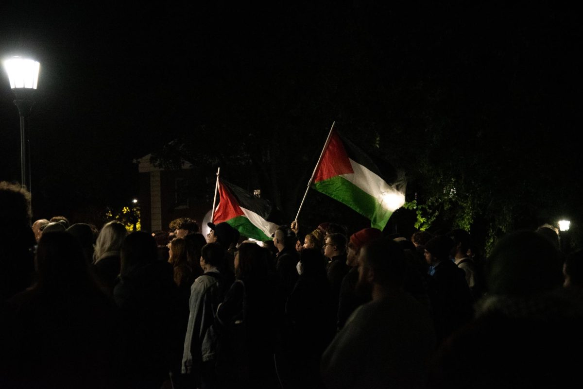 Students and community members gather on the Waterman green Oct. 19.
