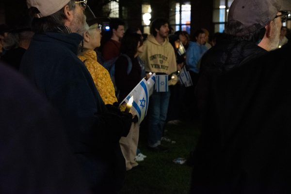 Attendees of Hillel’s Vigil for Israel held candles and Israeli flags memorializing those lost in the past week Oct. 12 