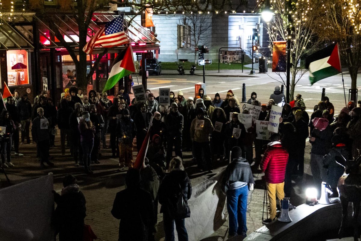 Community+members+gather+outside+City+Hall+calling+for+the+protection+of+Palestinians+Nov.+26