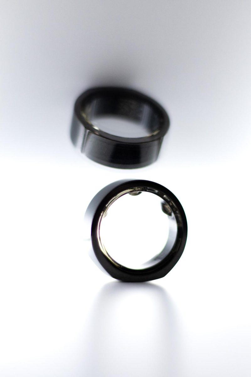 Photo illustration: Oura Rings function as biosensors to provide personalized health guidance.
