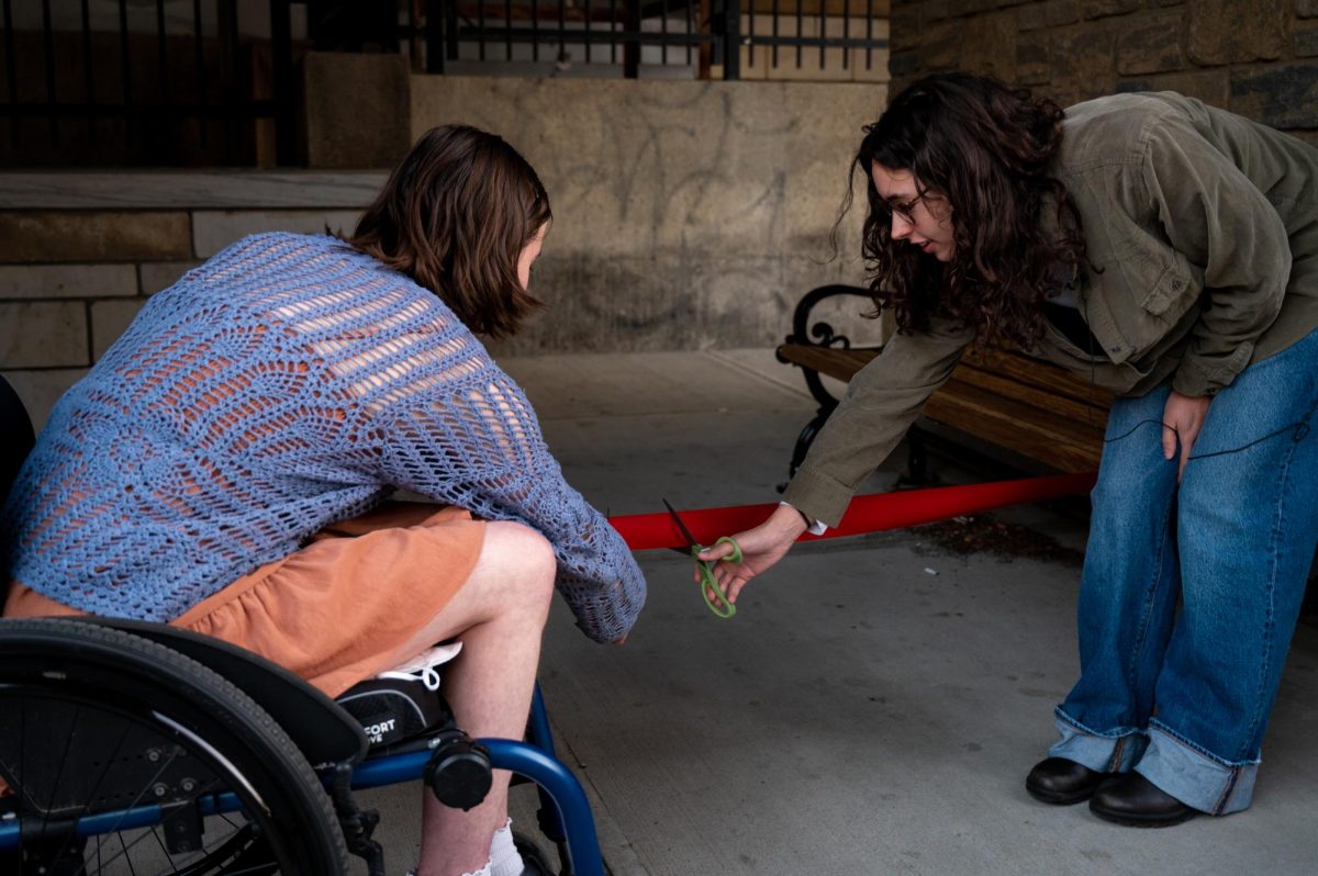 UVM Disabled Students Union held a ribbon cutting ceremony to celebrate the installation of eight new benches at campus bus stops Oct. 22.