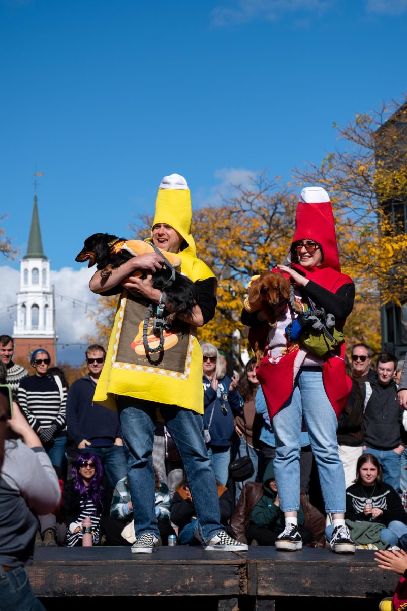 Ketchup and Mustard with their weiner dogs.