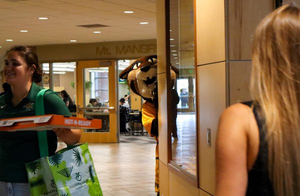 Rally peeking out from around a corner in the Davis Center Nov. 1. 