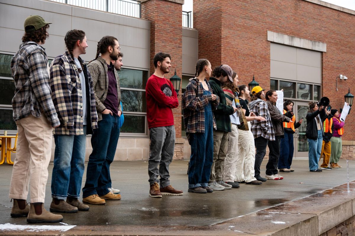 The contestants line up on stage waiting to be judged.