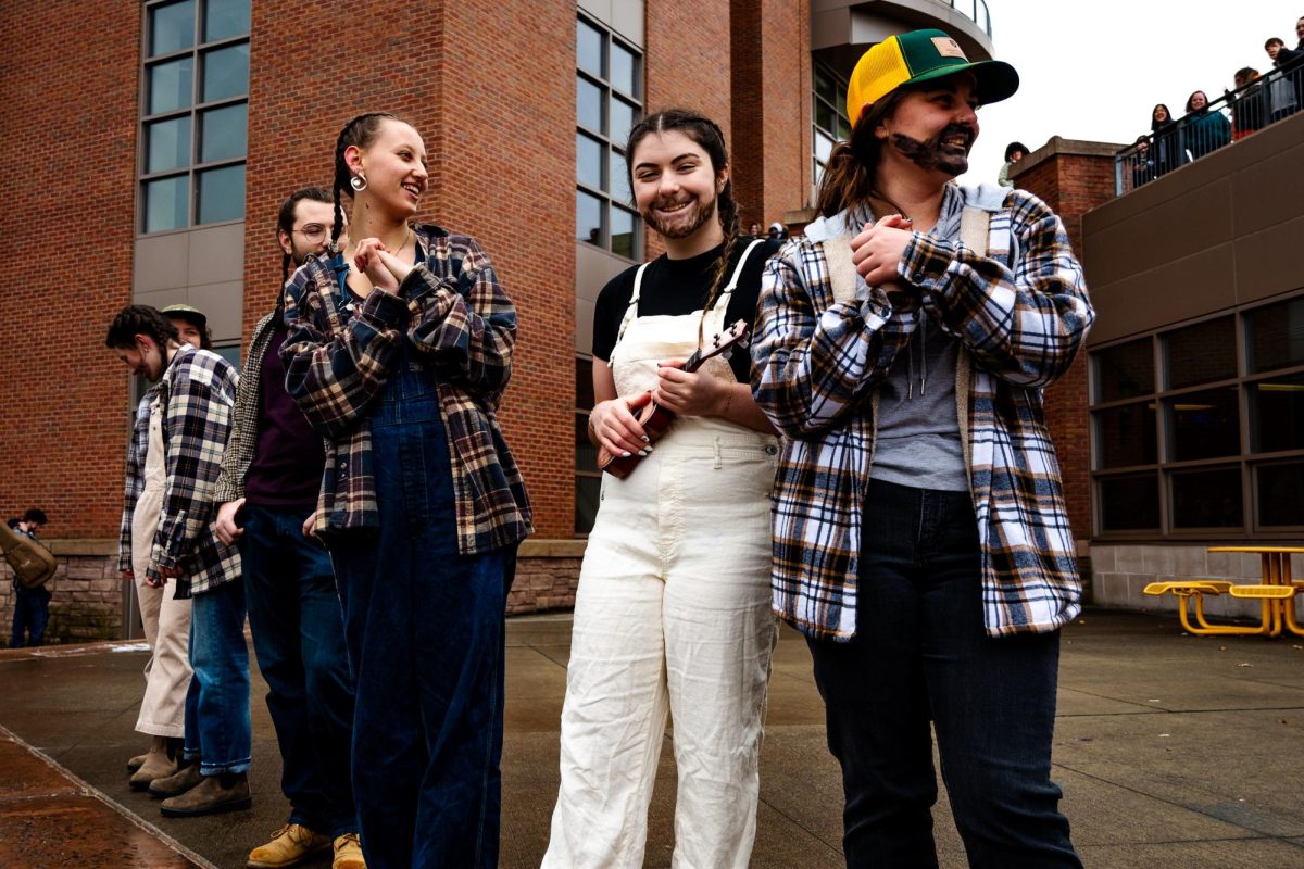 The other contestants cheer for each other during judging.