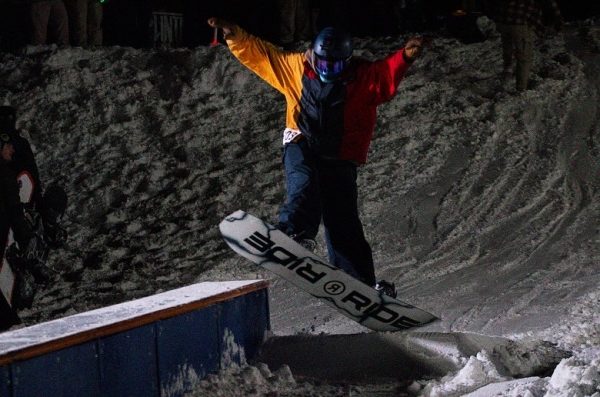 A snowboarder jumps the rail Feb 6.