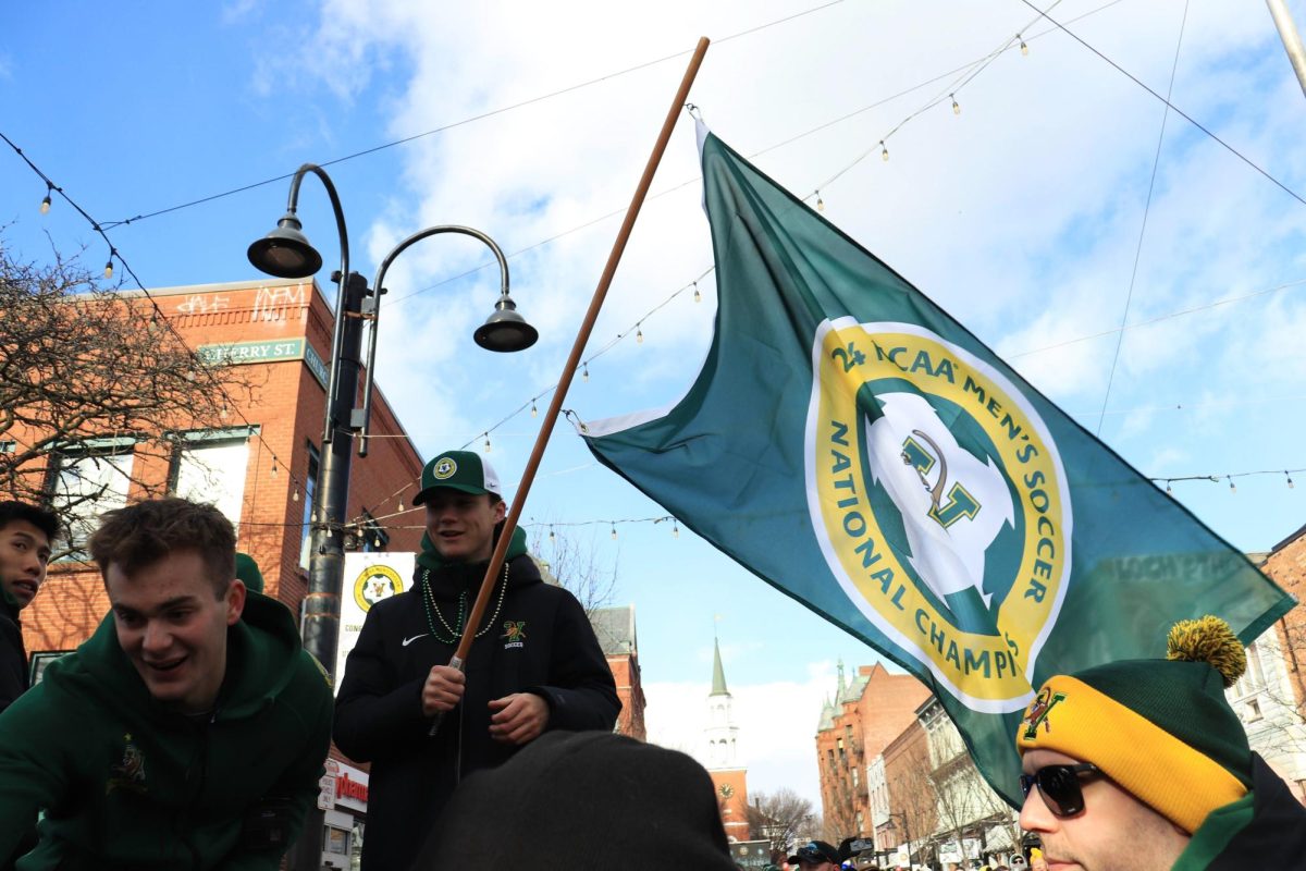 A member of the team holds up the team flag Jan. 26.