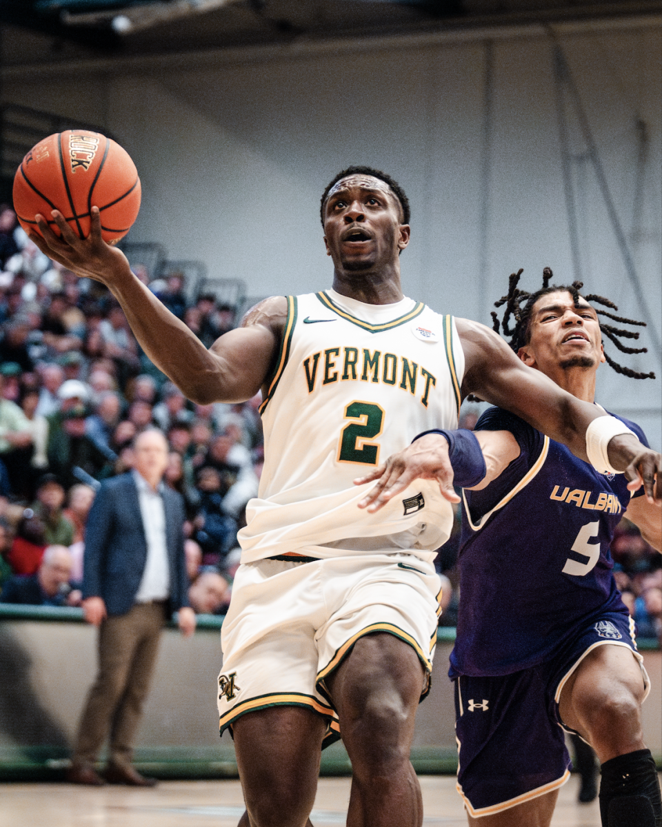 UVM men's basketball defeats Albany 79-71 March 4.  