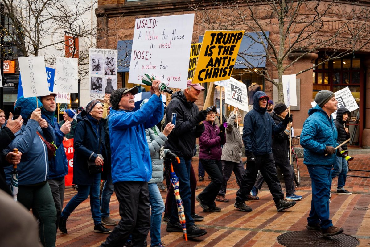 Demonstrators march down Church Street. 