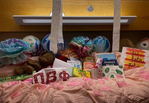 Ashley's bed is decorated for a big/little reveal Oct. 19, 2022.