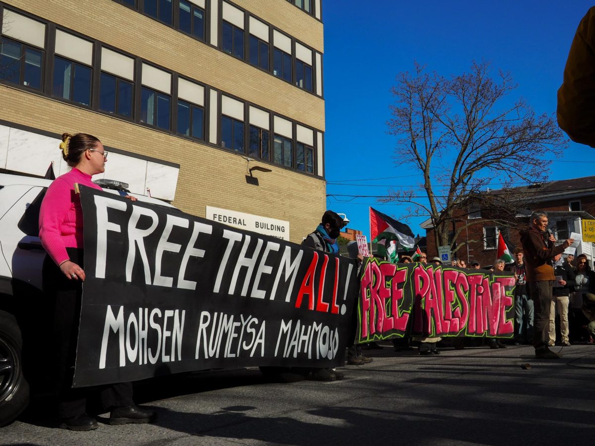 Banners are displayed outside the courthouse. 