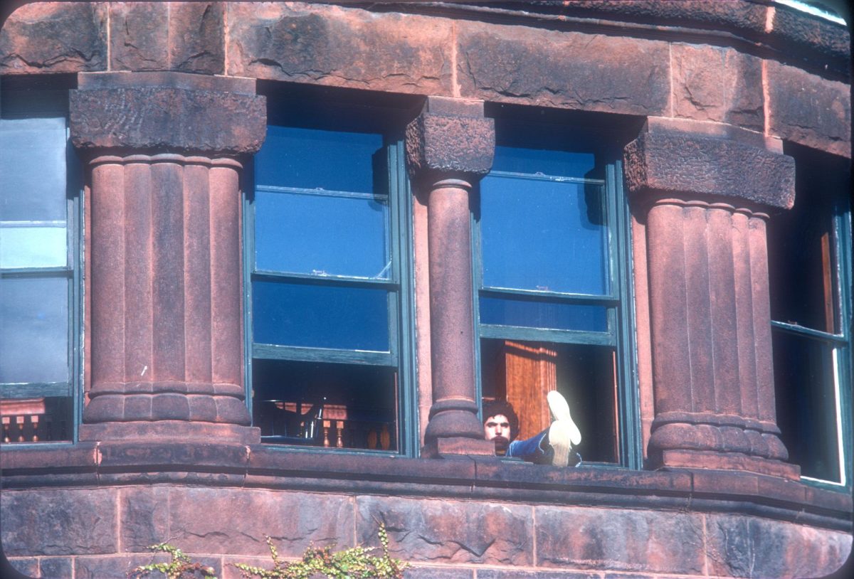Student sits in the window of the library 1974. 