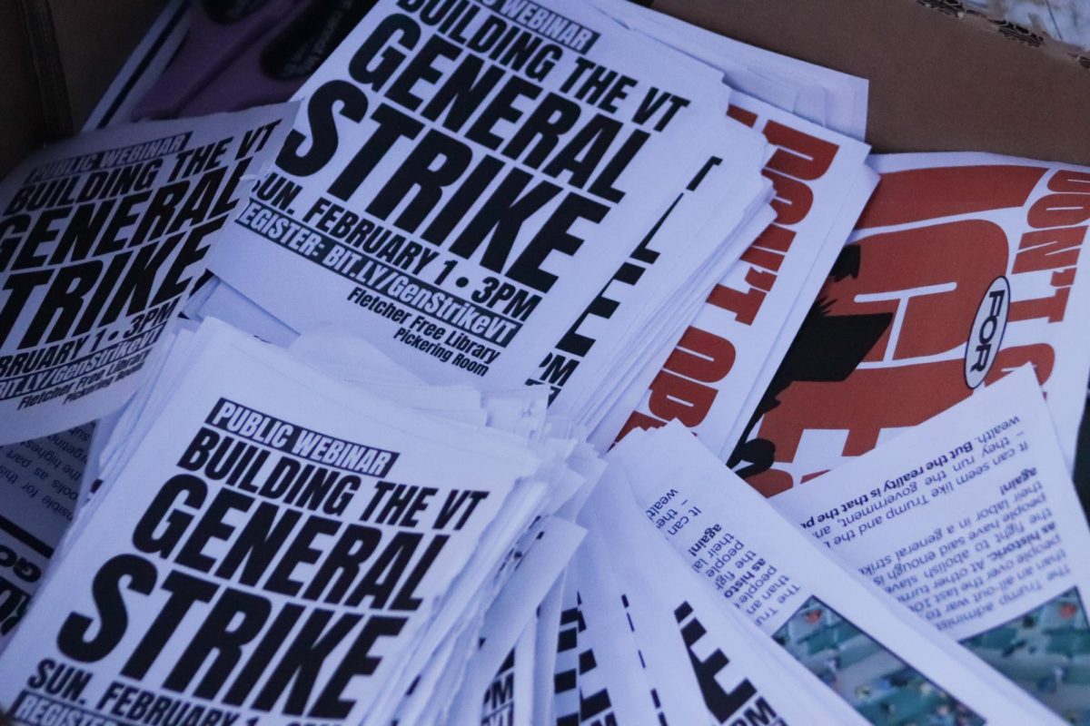 A box of informational posters regarding anti-ICE protests and strikes in Vermont.
