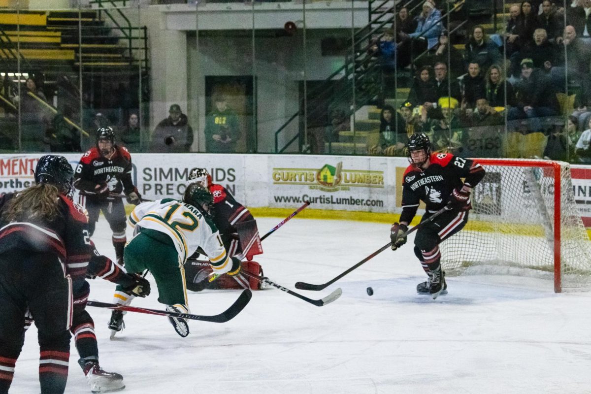 UVM Women’s Hockey Forward Lauren O’Hara takes a shot on goal Feb. 7.