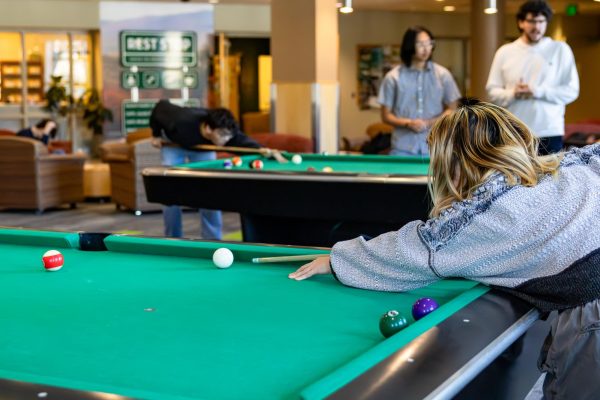 People play pool in the Davis Center, Feb. 19